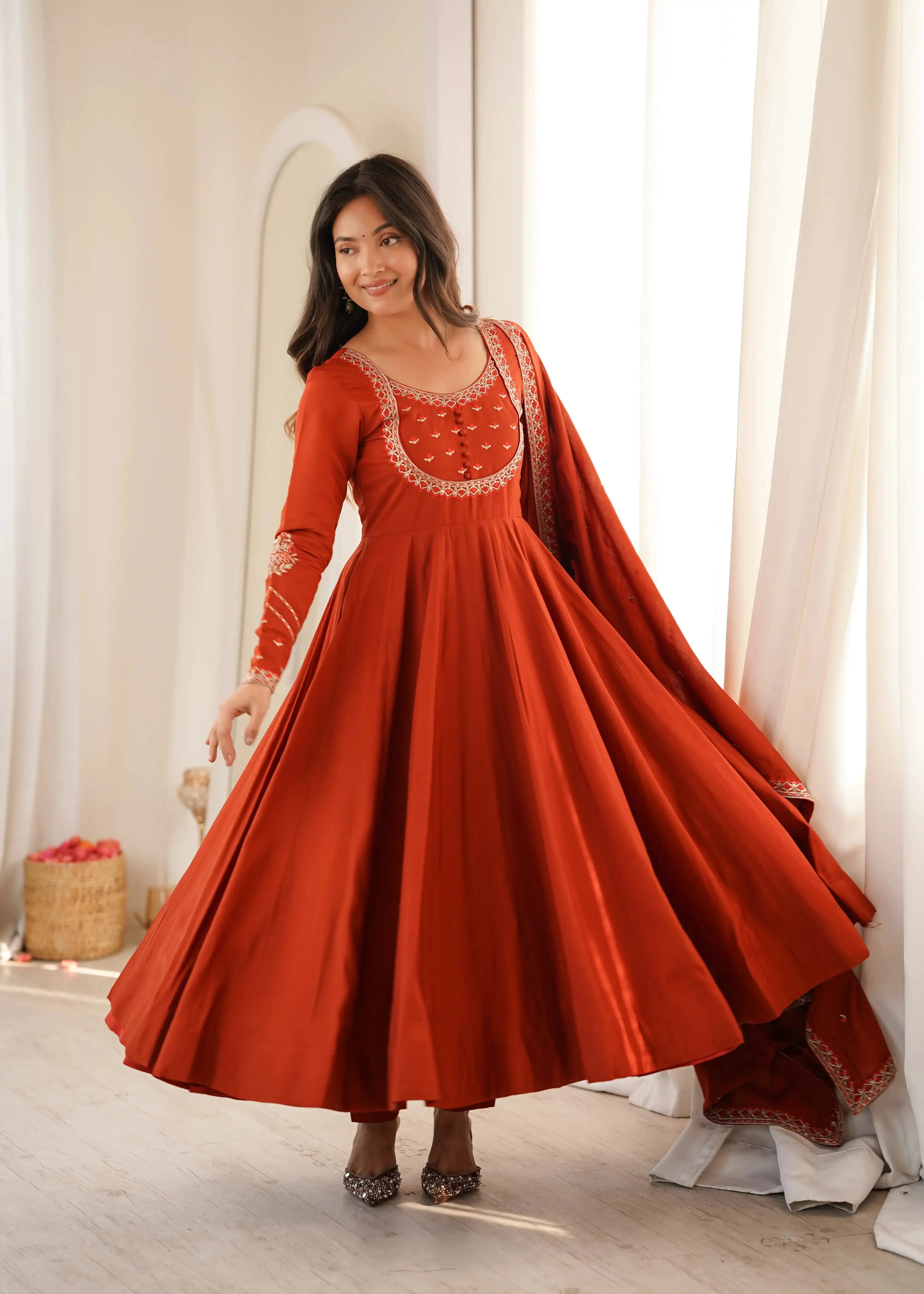 Light Orange Thread Work Anarkali Suit side view model twirling dupatta
