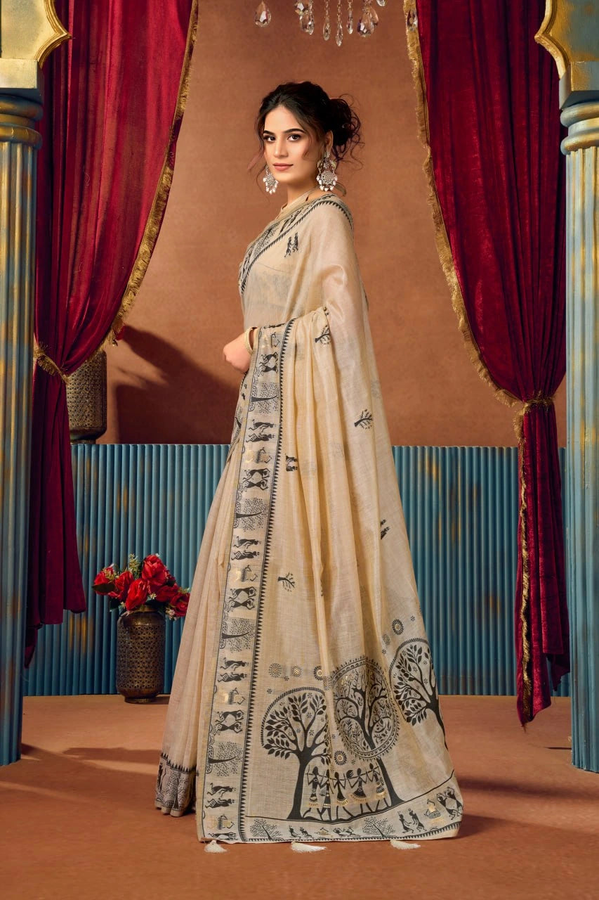 Woman in a traditional outfit with intricate patterns standing in front of red curtains.