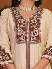 Beige kurta with brown floral embroidery on a plain background