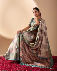 Woman wearing a traditional saree with a patterned design on a beige background