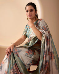 Woman wearing a traditional saree with a floral pattern on a beige background