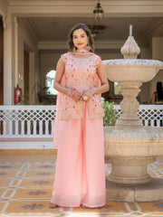Light pink star georgette suit with shimmering embroidery accents.