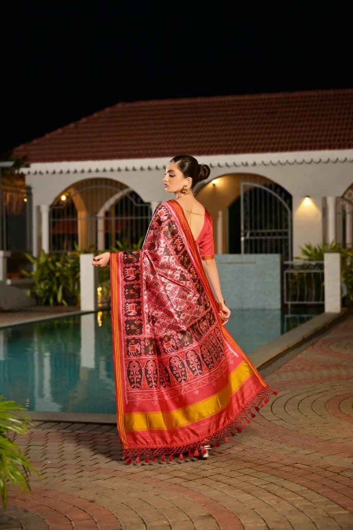 Detailed product listing of light pink Ikkat print Patola silk saree from Kalyanja Fashion