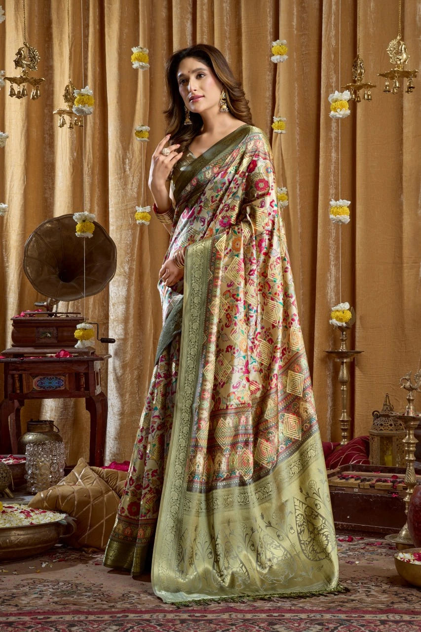 Woman in a floral saree standing in a decorated room with traditional decor.