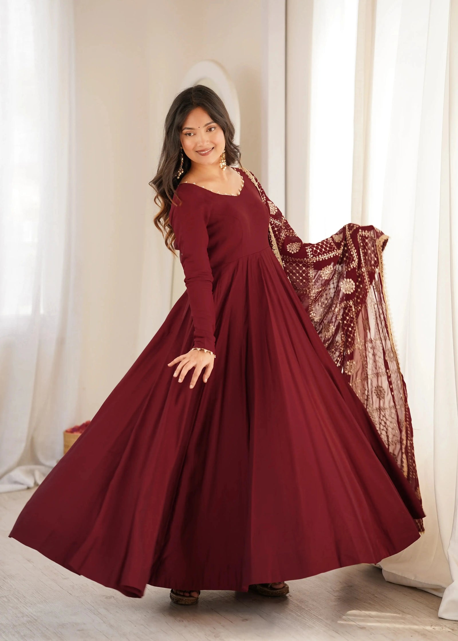 Maroon Sequins Embroidered Anarkali Suit twirling full flare with dupatta