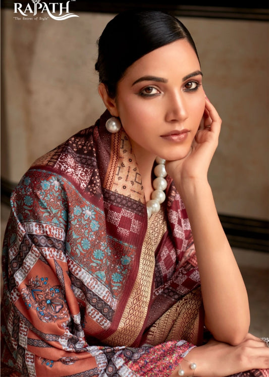 Woman wearing a patterned shawl with 'Rapath' branding in the corner.