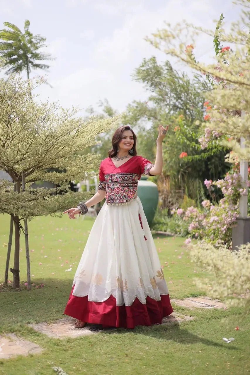Elegant Ivory White Party Wear Lehenga featuring Designer Embroidered Blouse, Floral Motifs, and Broad Maroon Hem Border