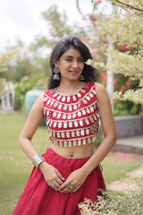 Gorgeous designer lehenga with statement mirror detailing and eye-catching golden circular patterns for a stunning celebration look.