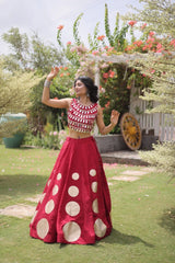 Designer festive lehenga crafted with shimmering mirror embellishments and premium fabric for a vibrant ethnic look.