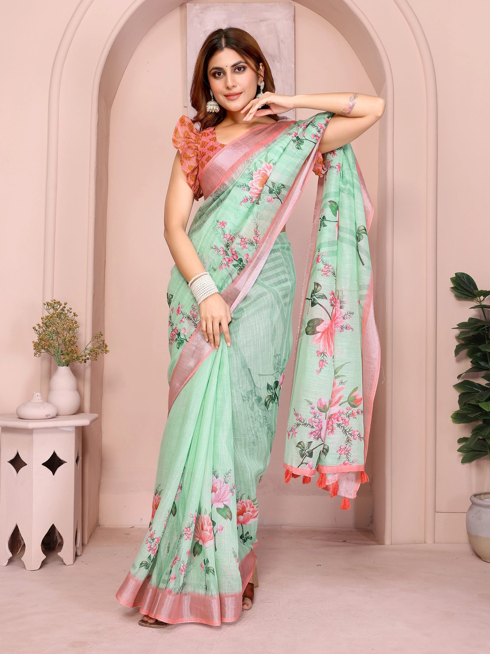 Mint Green Digital Floral Print Saree on model – romantic pink florals on mint linen cotton with ruffle blouse