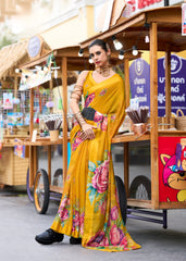 Woman in a yellow floral dress standing in front of a food cart.