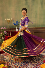 Twirling view of multicolor lehenga showing all three color panels with gota lace border detail