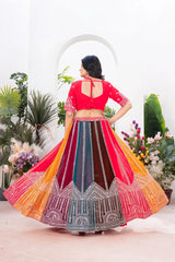 Back view of multicolor lehenga showing U-back choli with dori tie-up and twirling circular skirt