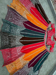 Top-down flat lay of 4-meter flair multicolor circular lehenga with full sequins and zari embroidery