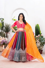 Multicolor circular panelled lehenga in red, orange, teal and maroon with silver zari embroidery
