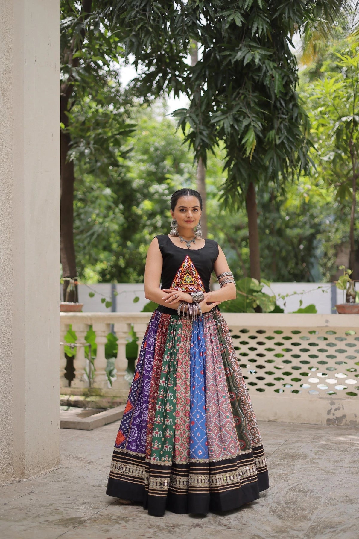 Festive multicolor digital print cotton lehenga featuring traditional gota patti and mirror lace detailing.”