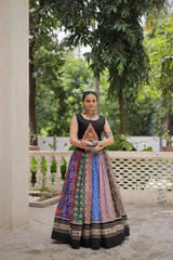 Festive multicolor digital print cotton lehenga featuring traditional gota patti and mirror lace detailing.”