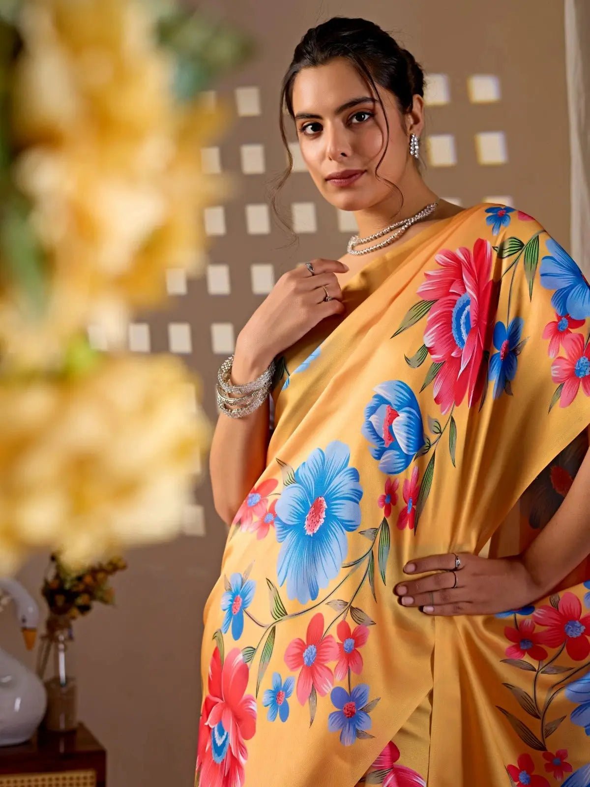 Close-up of blue and pink digital floral print on Mustard Yellow Saree