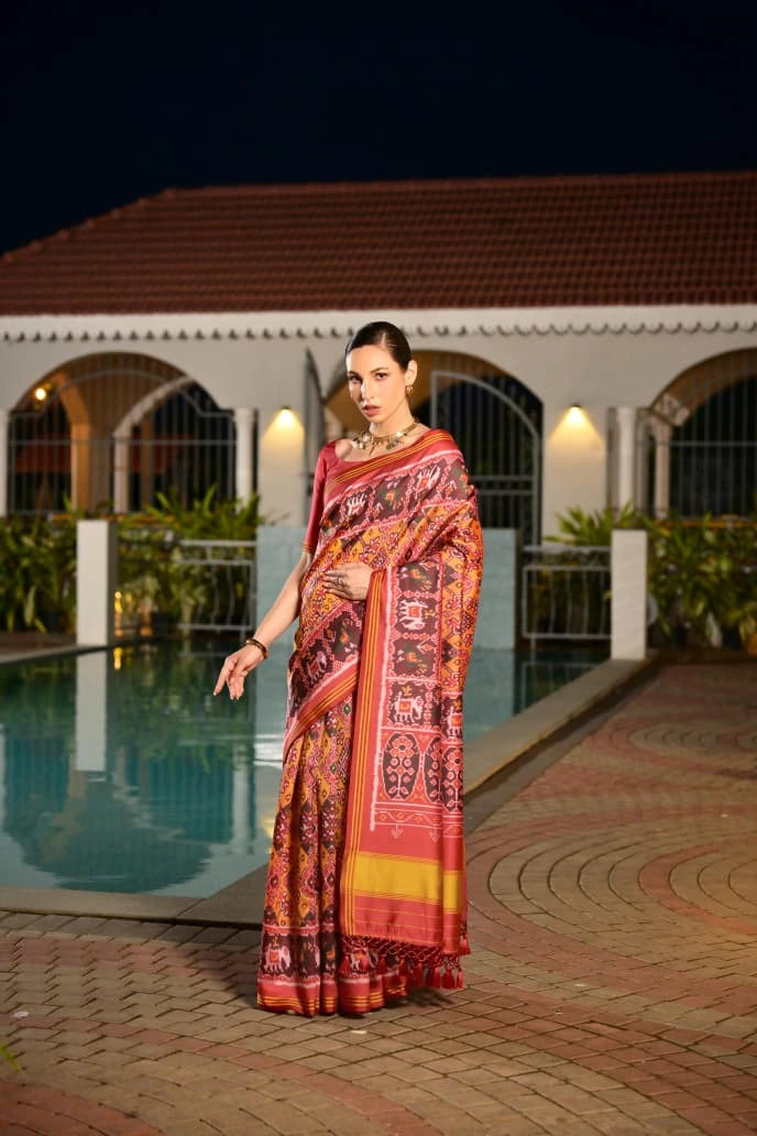 Detailed product listing of mustard yellow Ikkat print Patola silk saree from Kalyanja Fashion