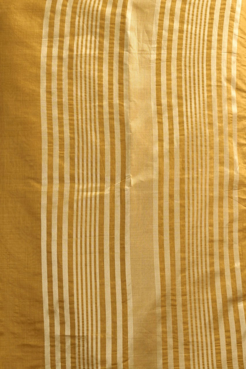 Close-up of gold fabric with thin white stripes