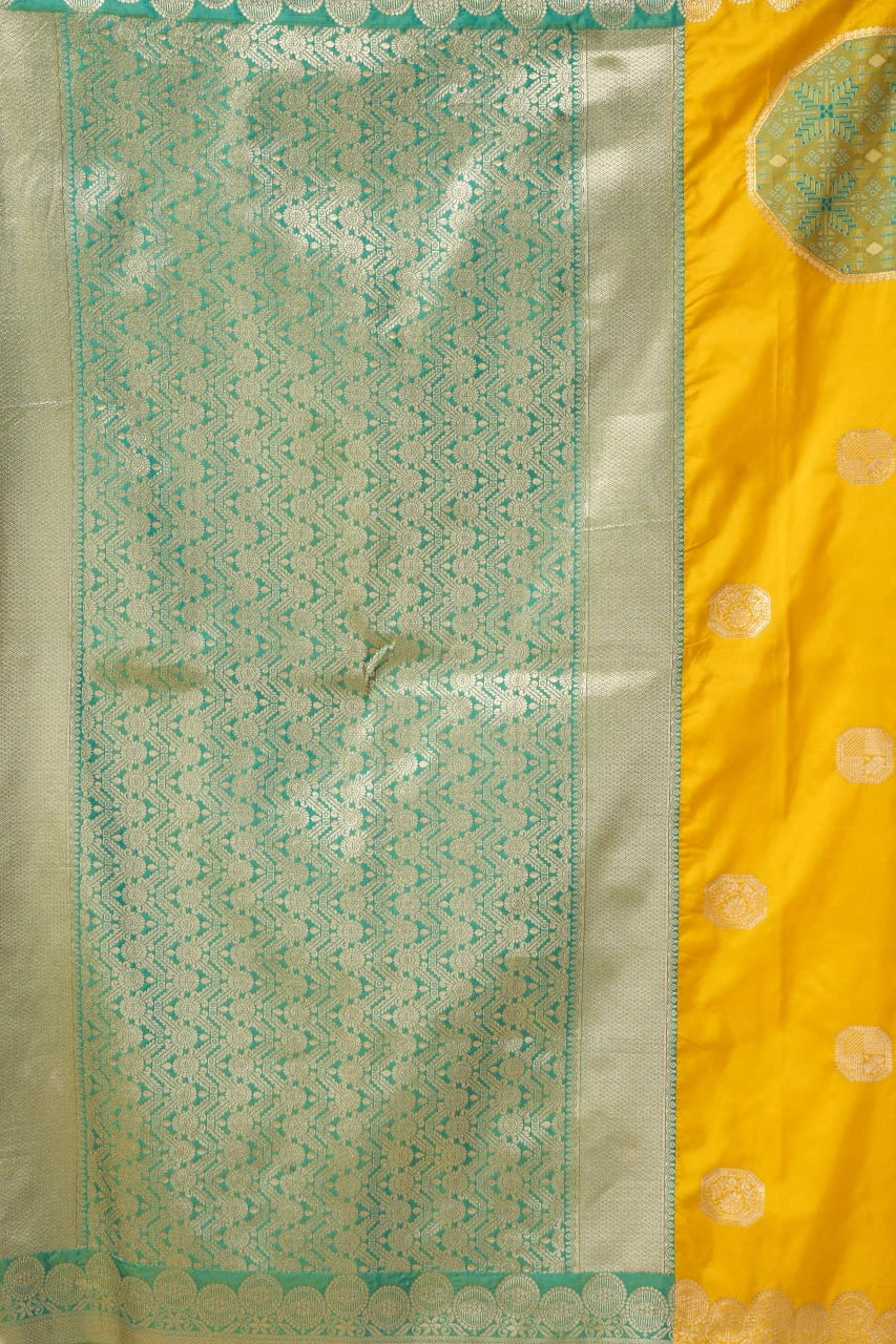 Traditional saree with green and yellow patterns