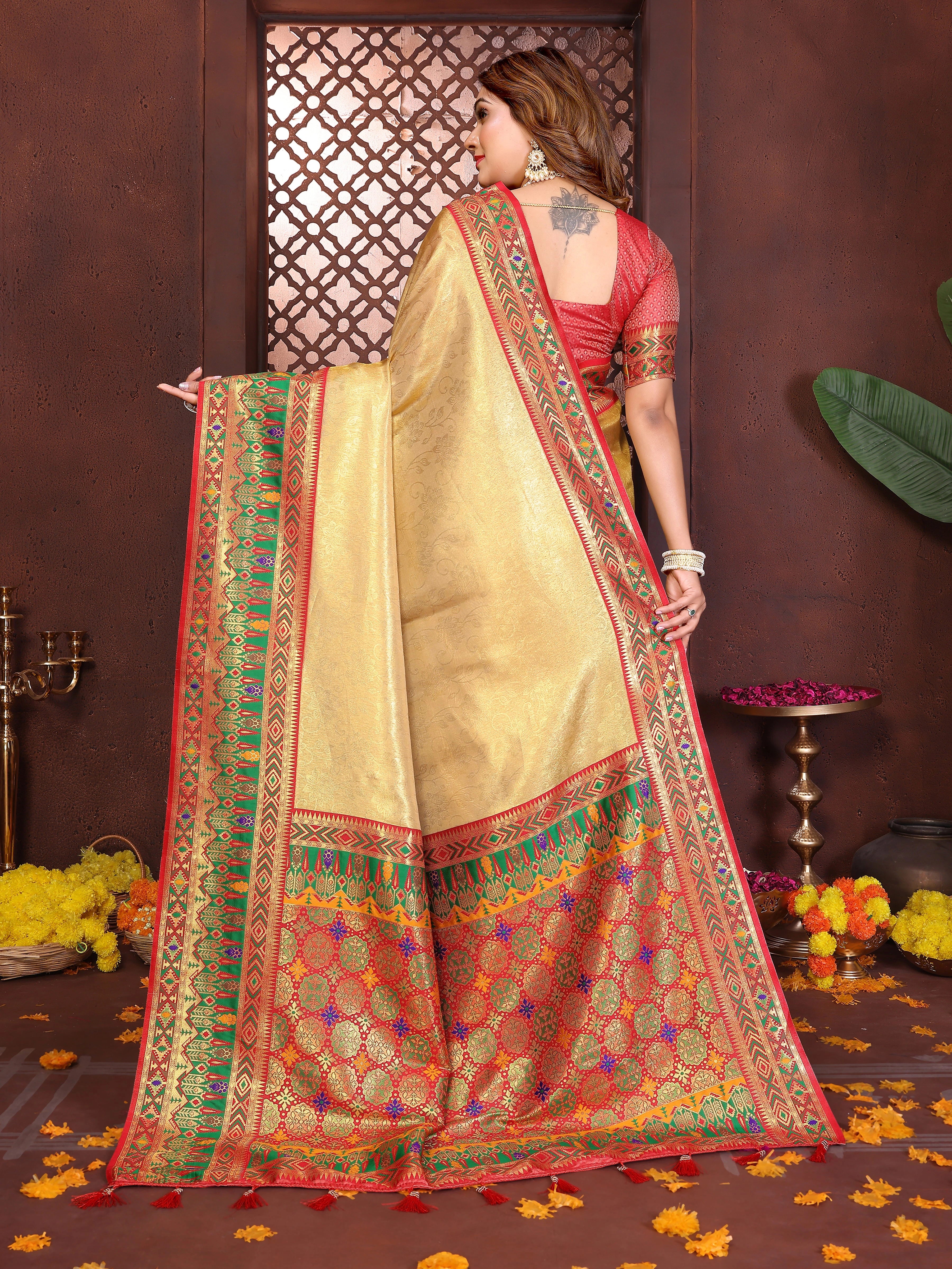 Handcrafted pure Banarasi tissue silk saree in mustard yellow shade featuring elegant zari patterns.