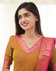 Woman wearing a traditional outfit with a pink border on a white background