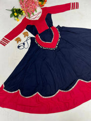 Flat lay of full navy blue mirror lace work lehenga set with pink choli and cowrie shell peplum overlay