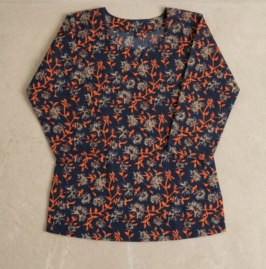 Floral patterned shirt on a beige background