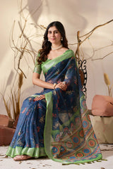Grace meets timeless elegance in this floral blue saree with a refreshing green border