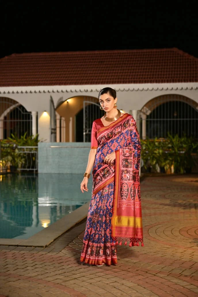 Detailed product listing of navy blue Ikkat Patola silk saree