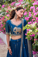 Close-up of navy blue lehenga highlighting shimmering sequins and delicate embroidery craftsmanship.