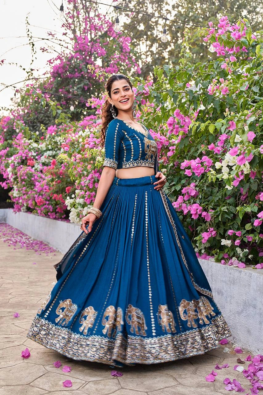Elegant navy blue Pure Fendy lehenga featuring intricate thread and moti embellishments.