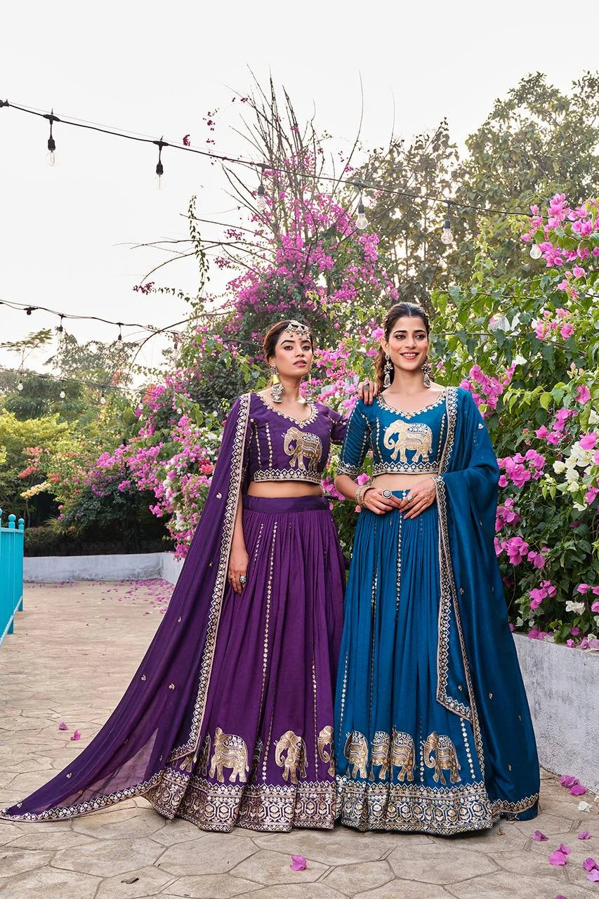 Luxurious navy blue Pure Fendy lehenga folded neatly, showcasing fine embroidery and sequins work.