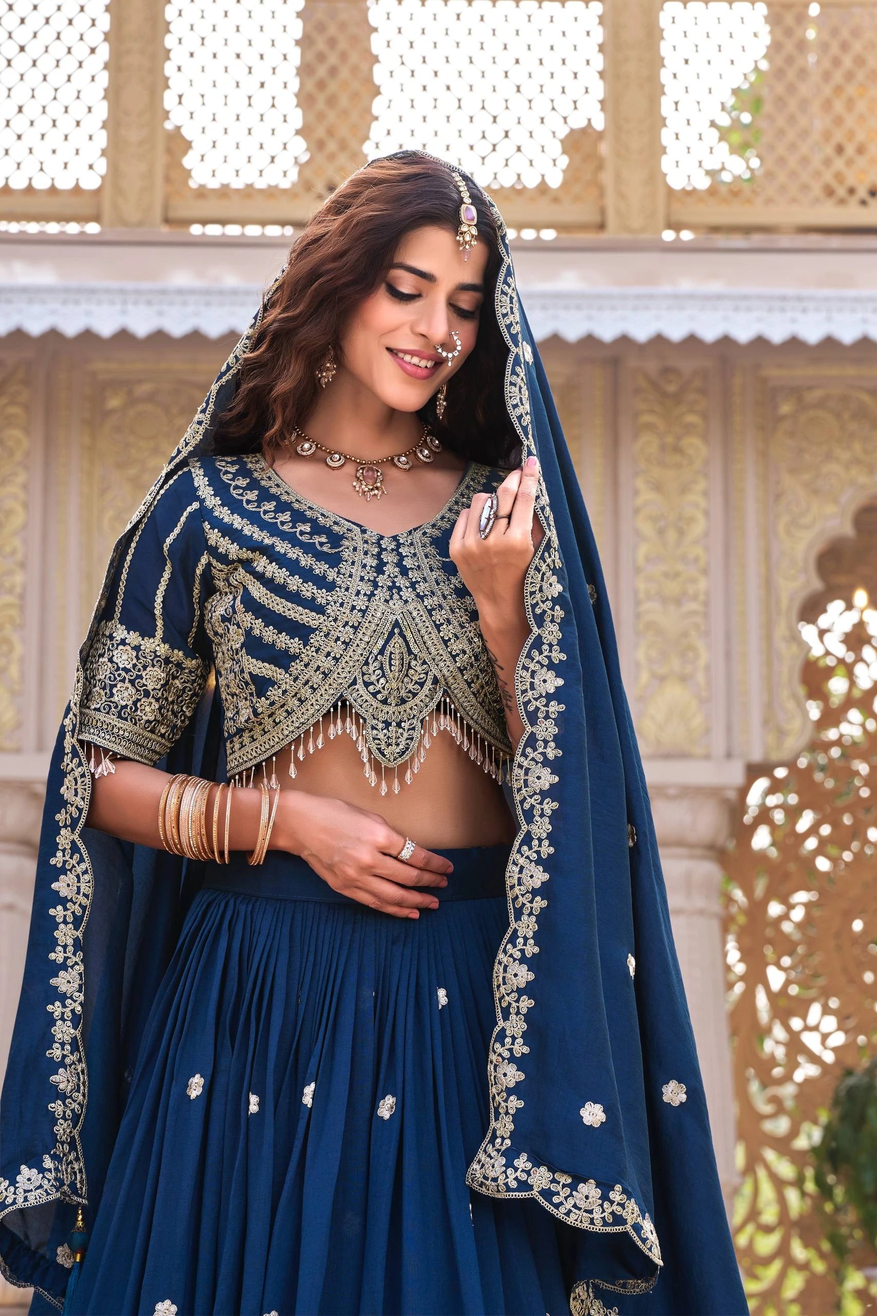 Detailed product listing of navy blue sequins embroidered lehenga from Kalyanja Fashion