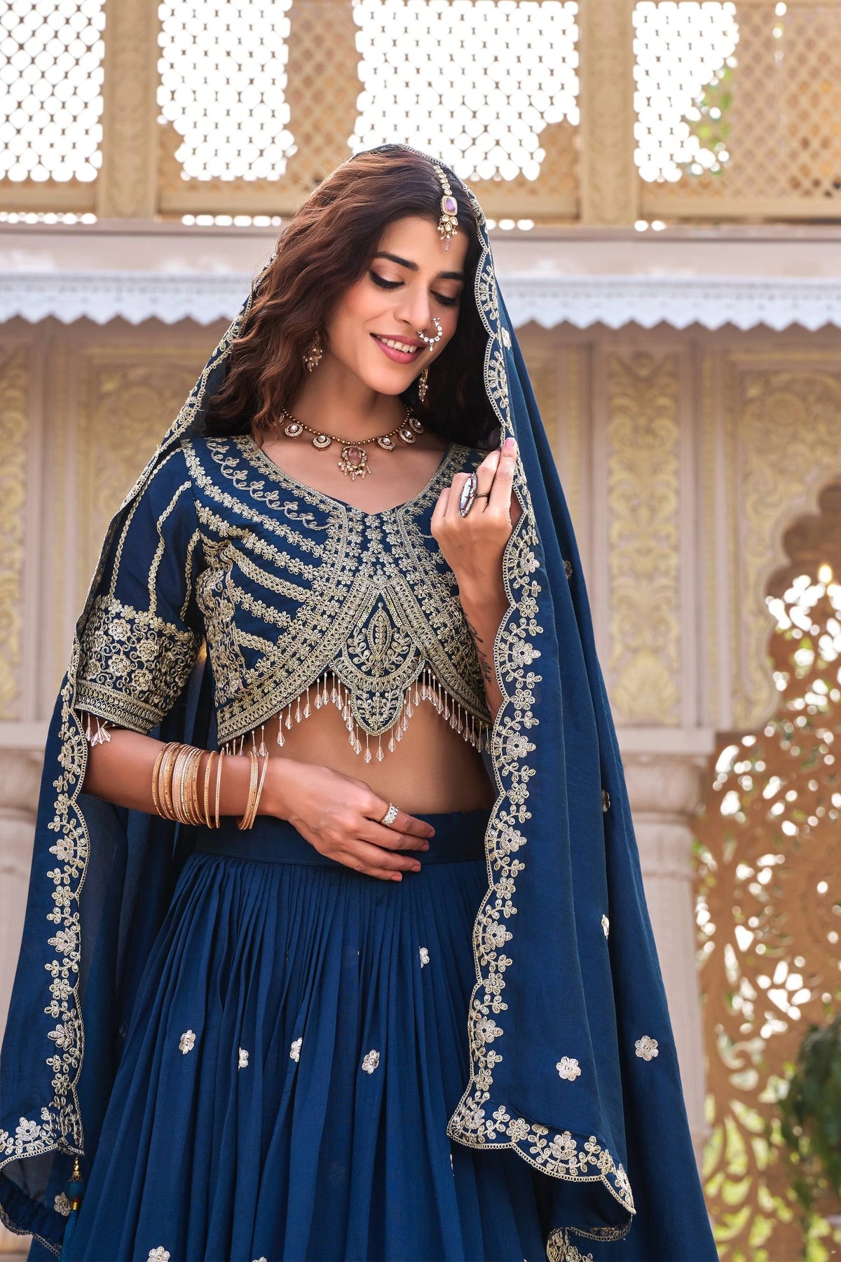 Detailed product listing of navy blue sequins embroidered lehenga from Kalyanja Fashion