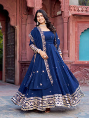 The overall style reflects regal elegance and classic Indian festive fashion.