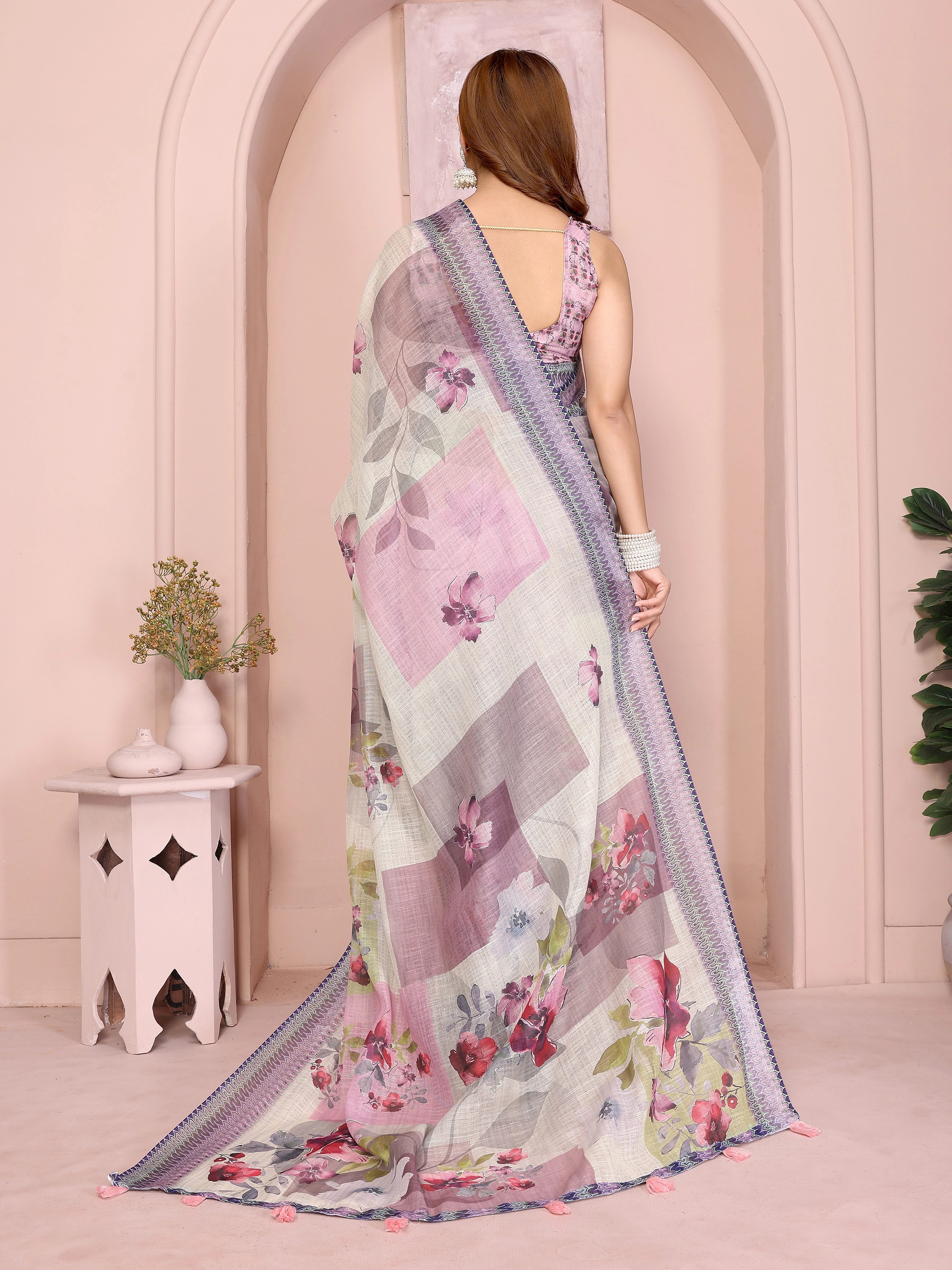 Back view of Off White Floral Print Saree in Linen Cotton showing blouse back and pallu drape