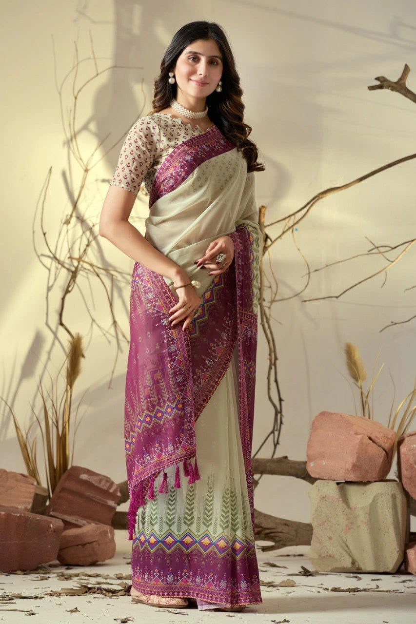 Woman wearing a white and purple saree with a neutral background