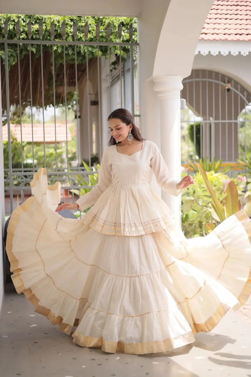 Stylish Women's Ivory White Lehenga Choli with Flared Silhouette, Decorative Golden Lace, and Ethnic Appeal