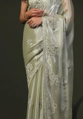 Traditional saree outfit with delicate lacework and jewelry styling