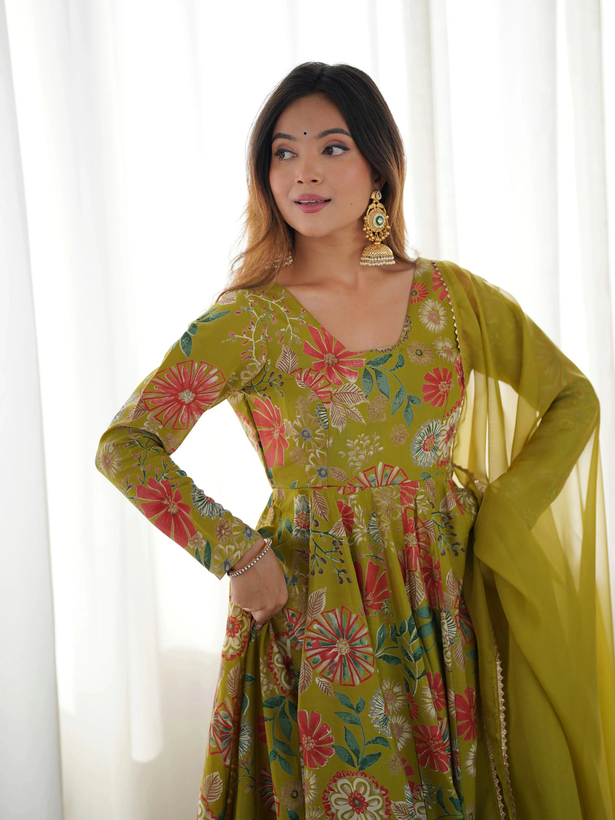 Close-up of Olive Green Discharge Print Suit sleeve and bodice