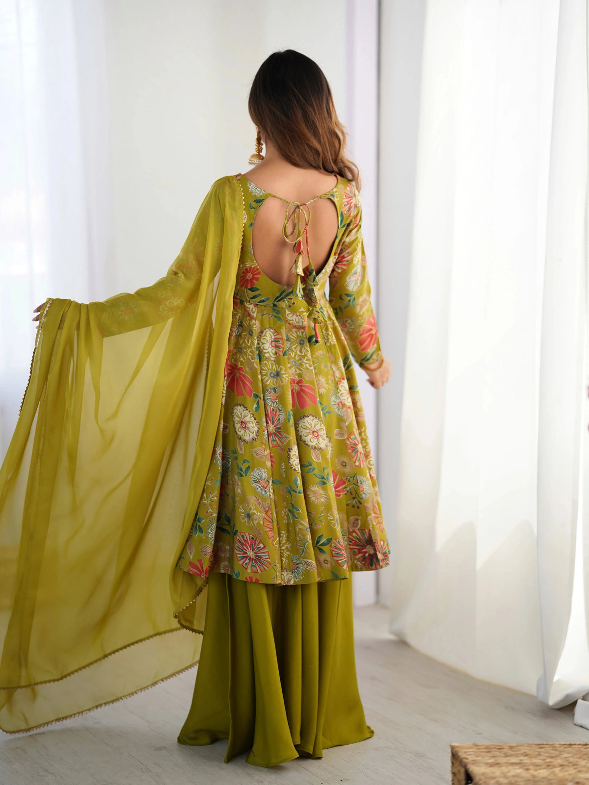 Olive Green Discharge Print Suit, side view with dupatta movement