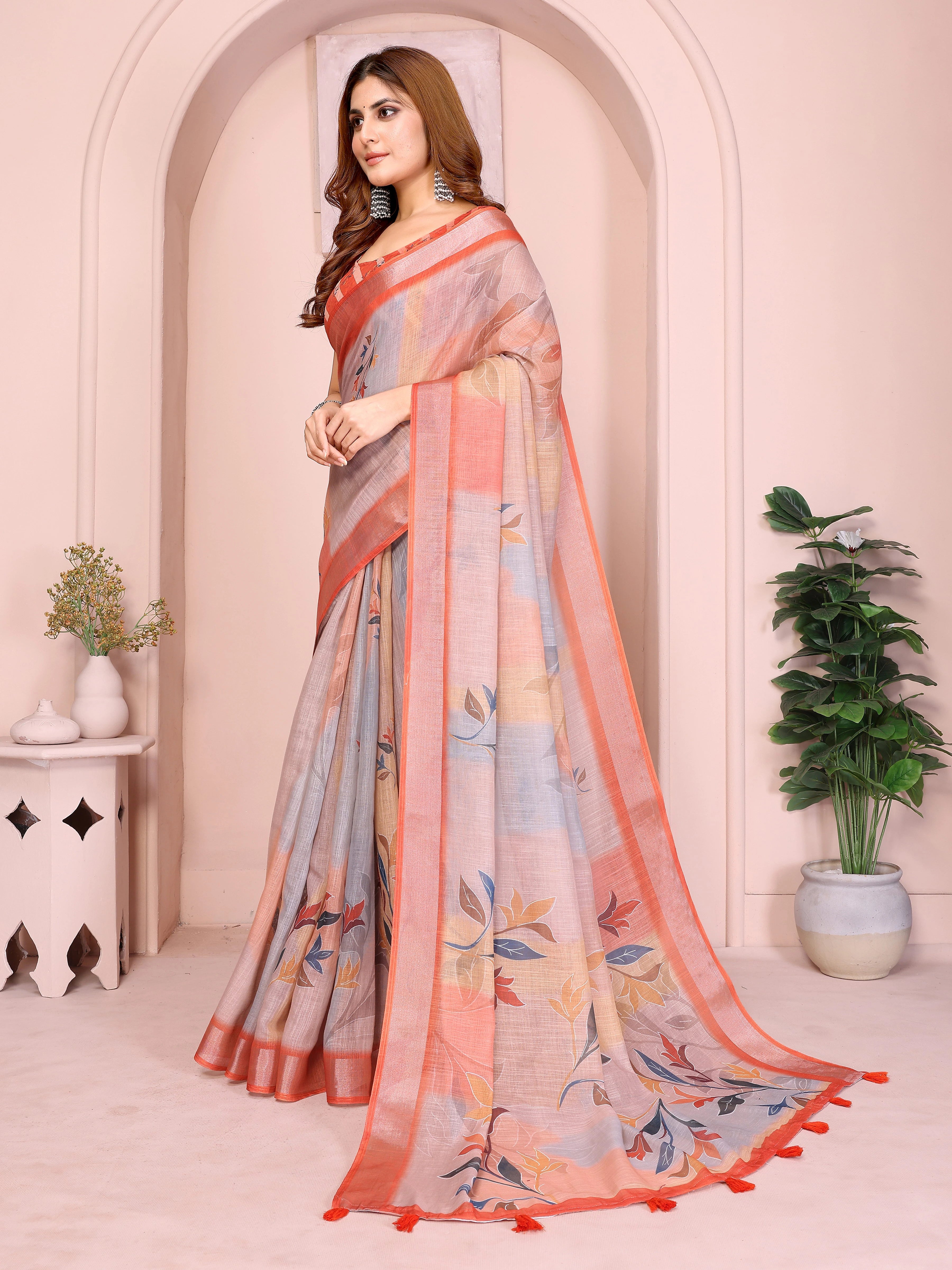 Orange Digital Floral Print Saree side drape – printed pallu with coral border and tassel detail