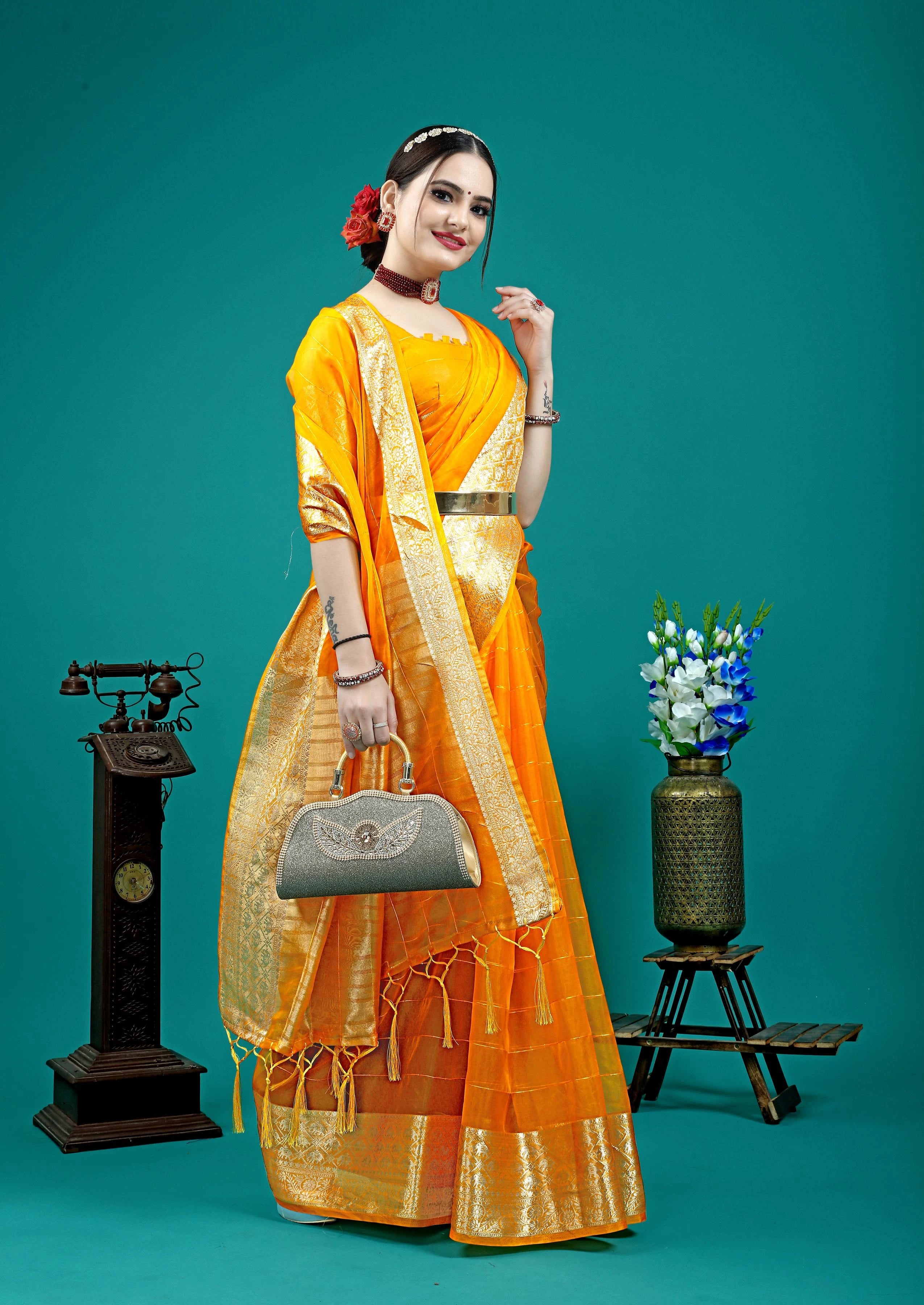 Traditional silk saree featuring rich pallu and tassel detailing.