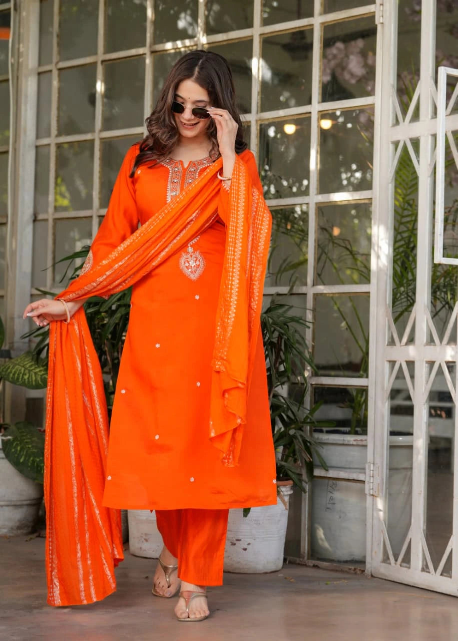 Stylish long orange kurti in Chanderi silk with full sleeves, thread embroidery, and zari work.
