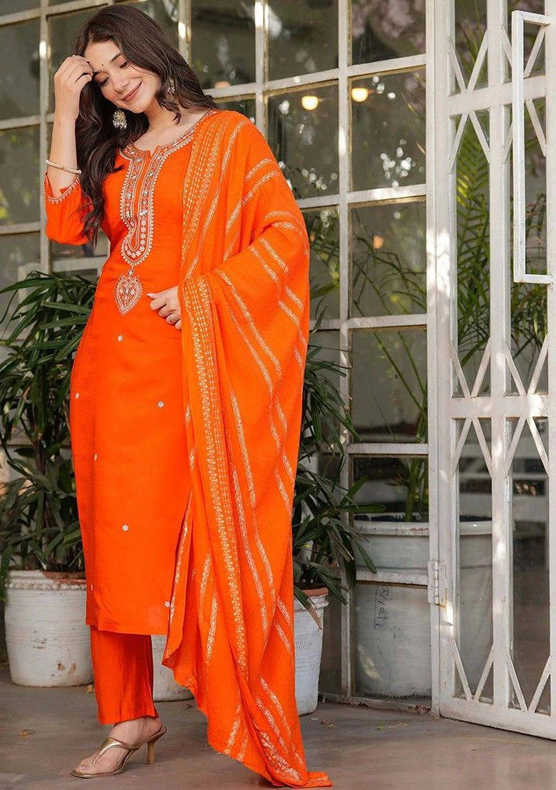 Elegant orange Chanderi silk kurti featuring detailed thread embroidery and shimmering zari accents.