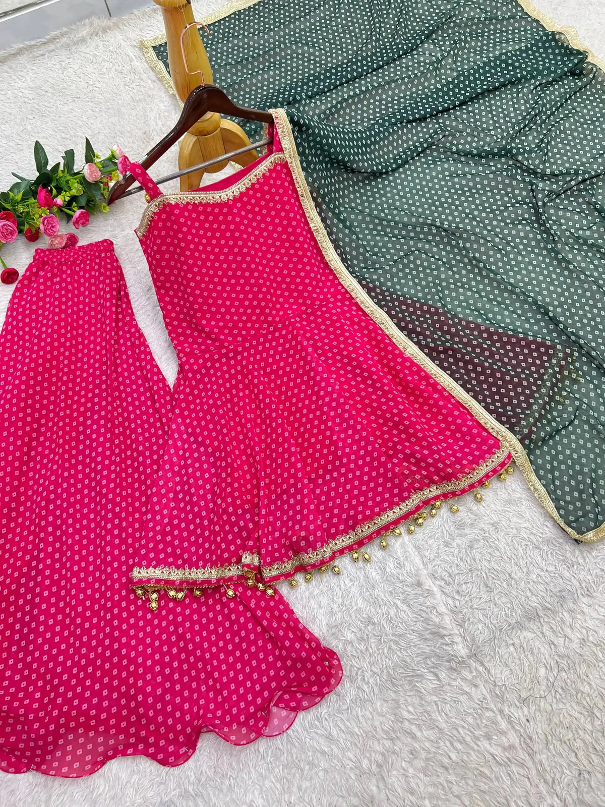 Flat lay of complete Pink Bandhej Print Suit set with palazzo and dupatta
