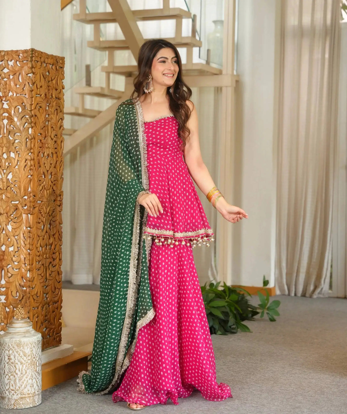 Pink Bandhej Print Suit side view with green bandhej dupatta draped
