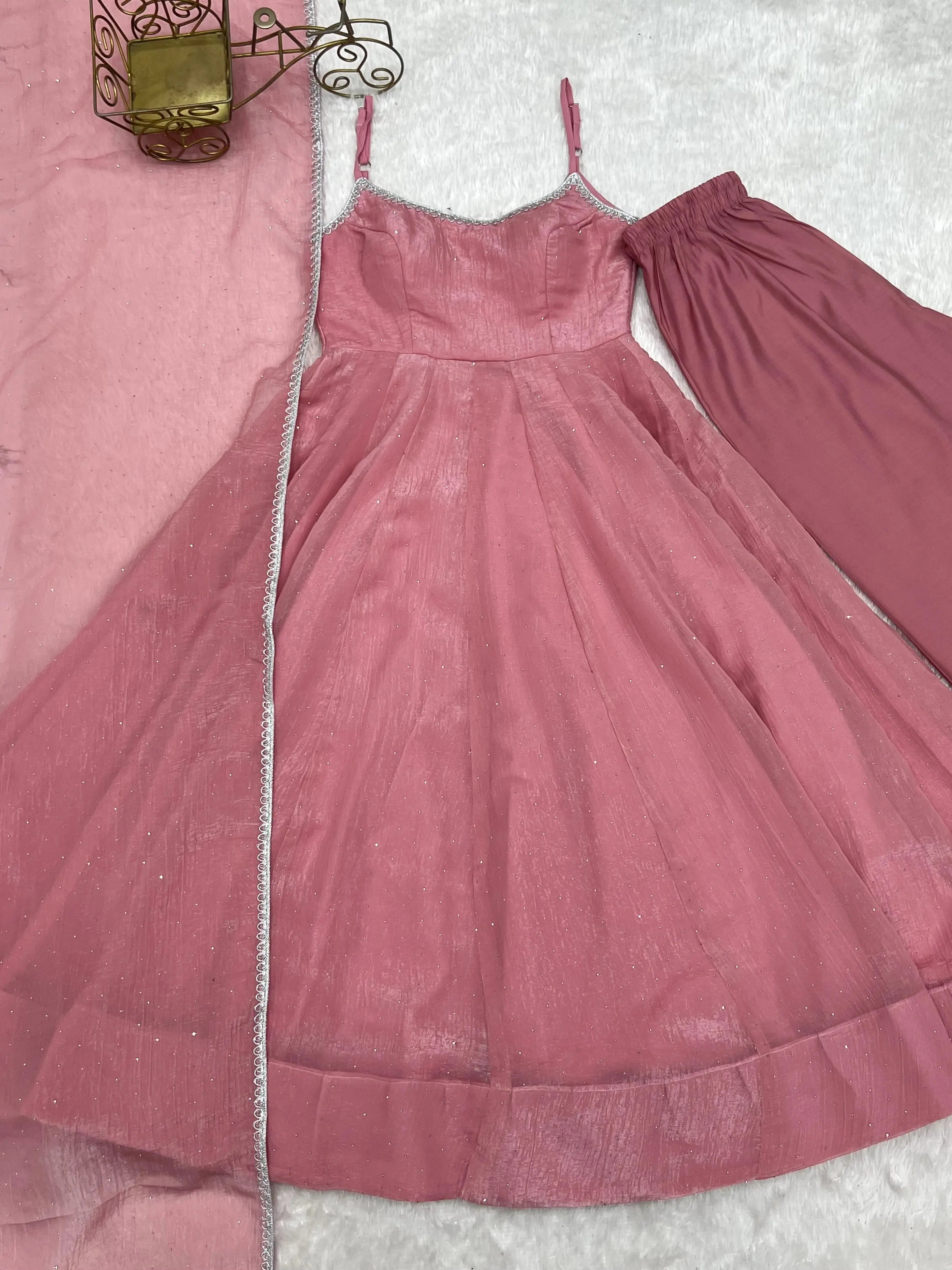 Pink Swarovski suit, pant and dupatta set laid flat